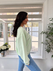 Mint Slogan V Neck Sweatshirt Dakota