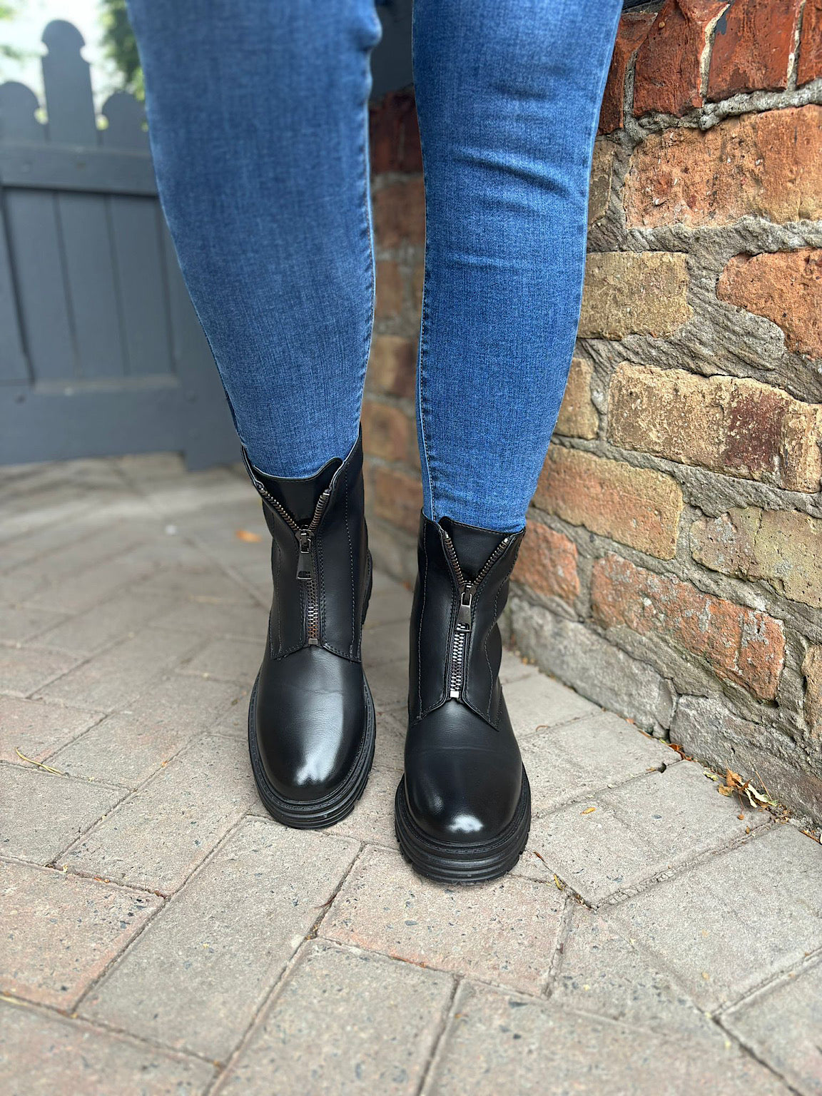 Black boots with zipper in front shop