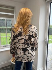 Black Circle Print V Neck Top Amy