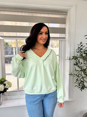 Mint Slogan V Neck Sweatshirt Dakota