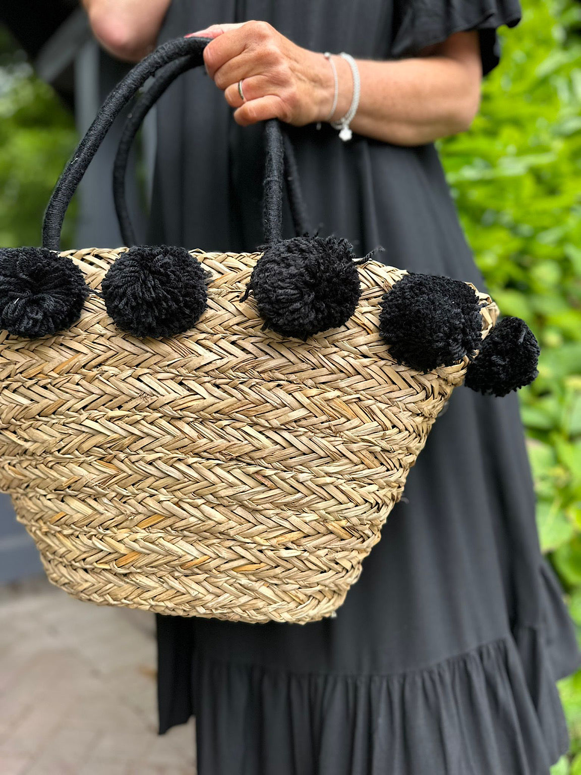 Straw purse with pom poms hotsell